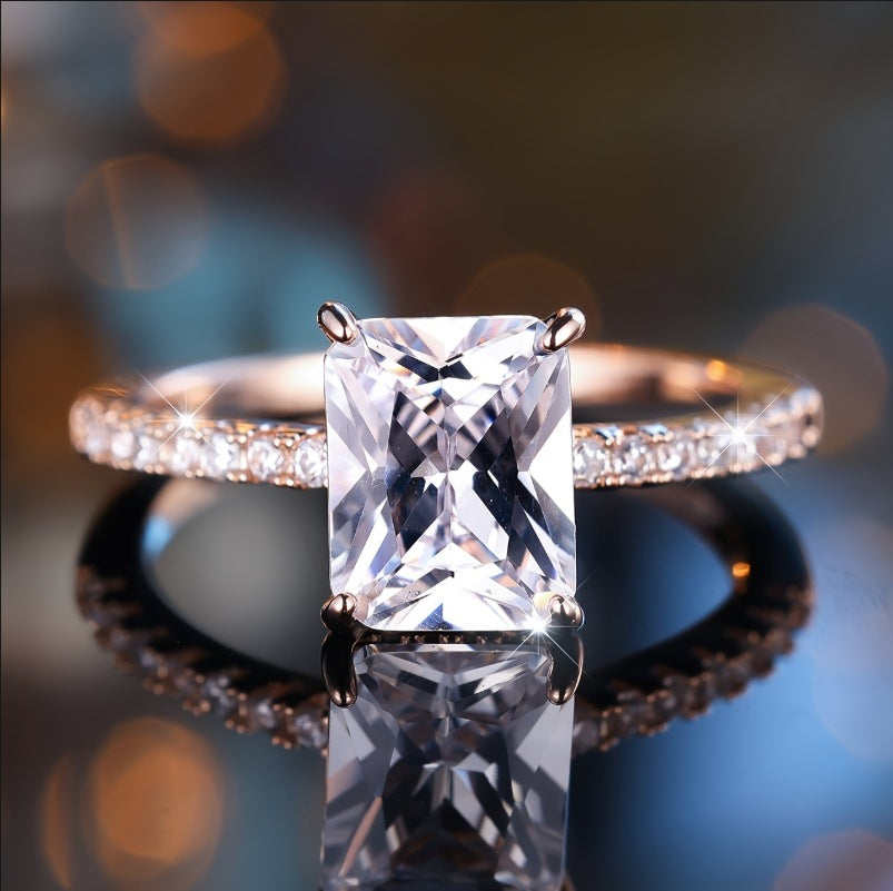 Rectangular White Diamond Four-prong Ring